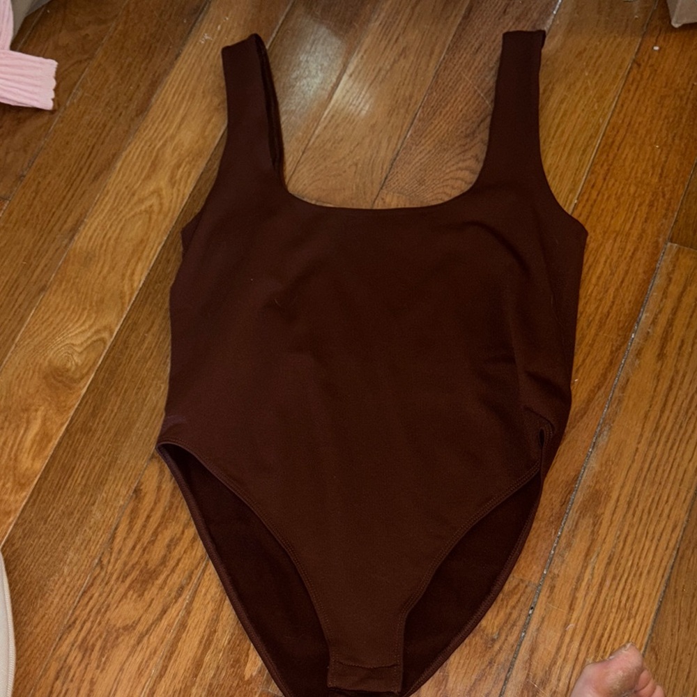 Woman’s Brown Body Suit, NWT.
